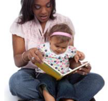 A mother reads a picture book to her toddler.