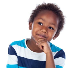 afroamerican child thinking isolated on a white background