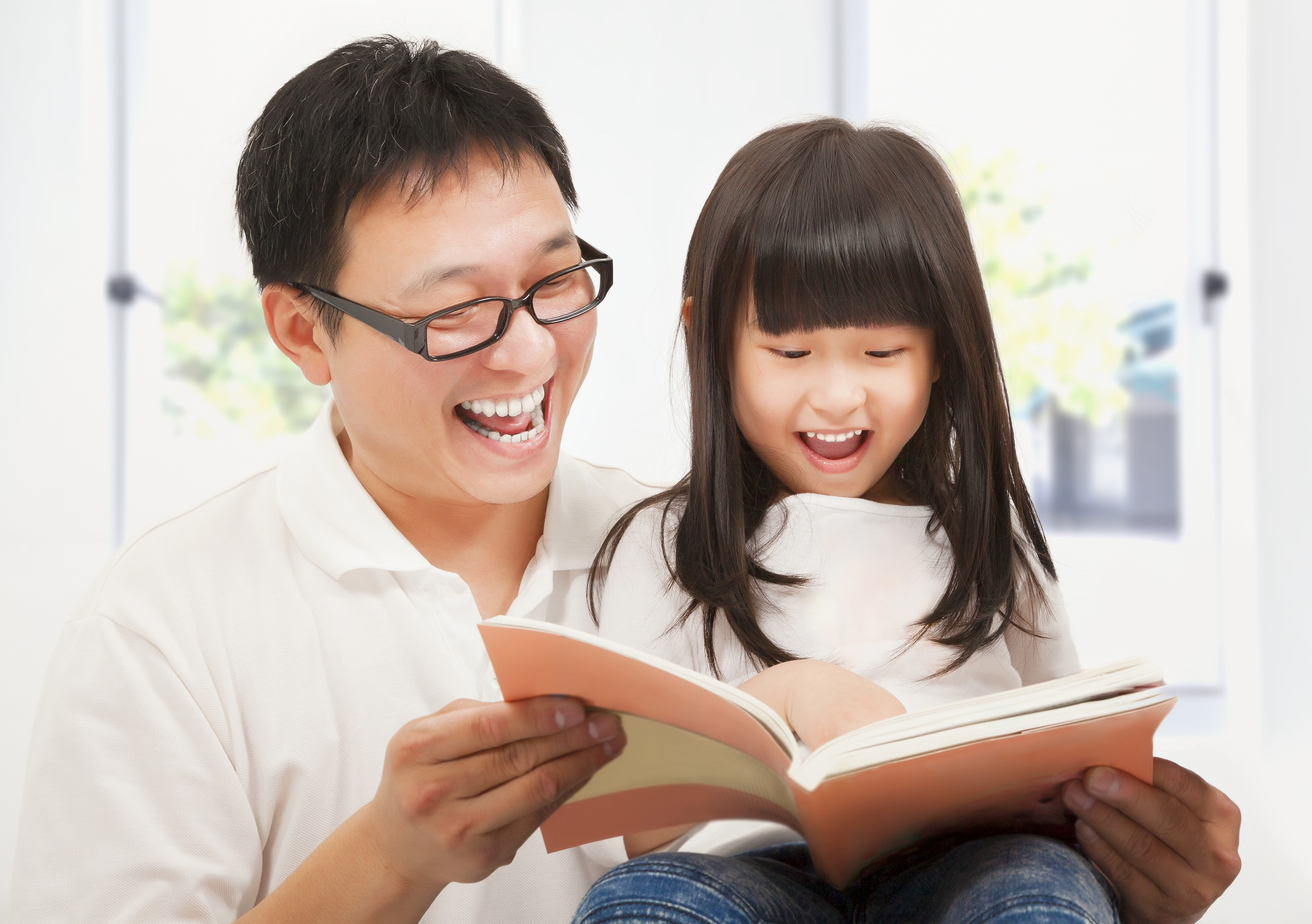 Father reading to child.