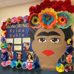La Profe Plotts' Frida Kahlo face bulletin board from Easy Spanish Classroom Decor Ideas.